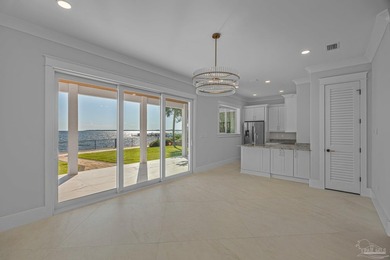 Few homes capture waterfront living like this. Behind the gates - photo 10