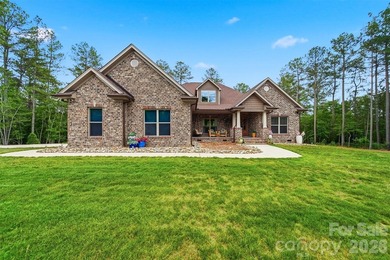 Custom home in a gated community, offering access to lake - photo 1