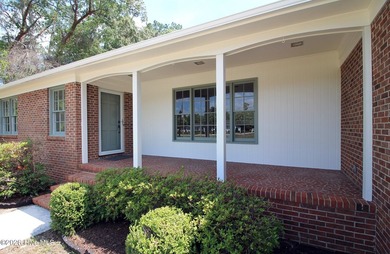 You need to see the interior of this home! It combines the - photo 3