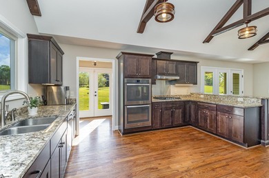 Located in the sought-after Smithfields golf community, this