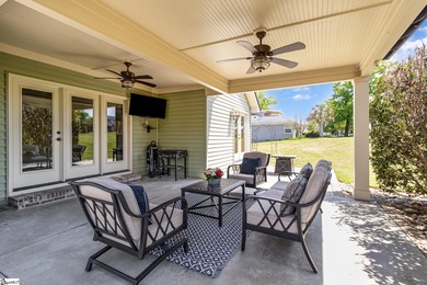 Located in the sought-after Smithfields golf community, this