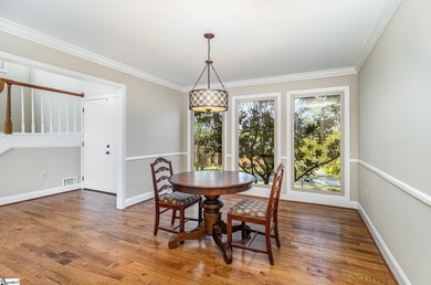 Located in the sought-after Smithfields golf community, this