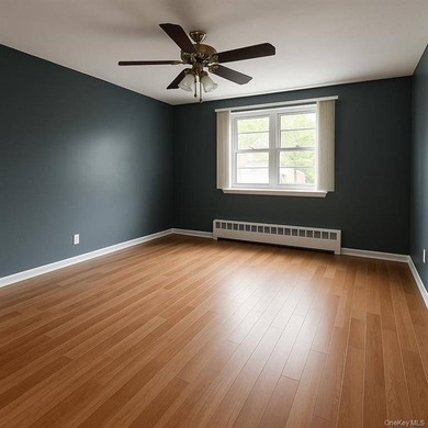 Well-maintained Legal 2- Family Brick House now available in the - photo 6