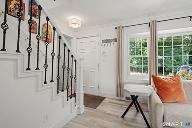 Fully remodeled with top-of-the-line finishes throughout, this - photo 2