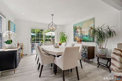 Fully remodeled with top-of-the-line finishes throughout, this - photo 6