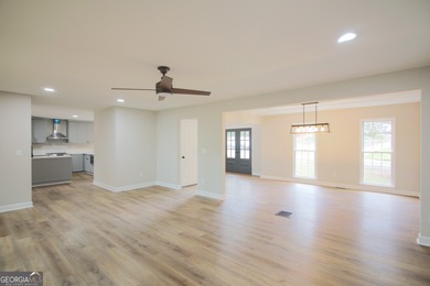 Renovations are complete! This huge home comes complete with a