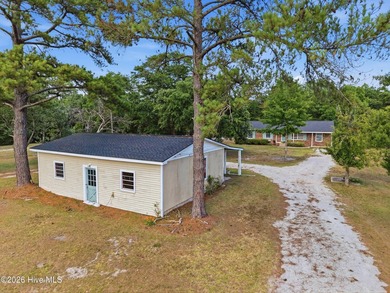 Unlock endless potential with this uniquely versatile 0.77-acre - photo 3