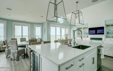 Nestled along a pristine stretch of coastline, this stunning