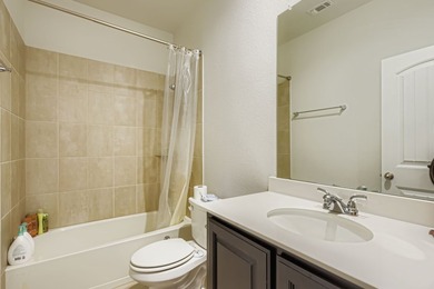 This like new, barely lived in smart home, features an open - photo 20
