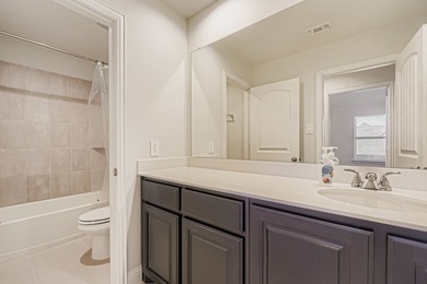 This like new, barely lived in smart home, features an open - photo 23