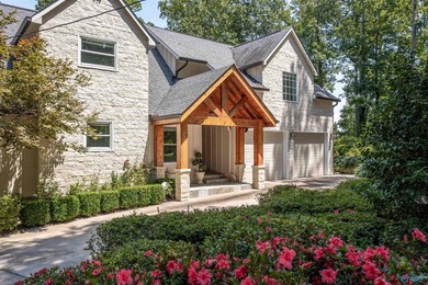 This gorgeous 2-story home w/spectacular waterfront views of - photo 2