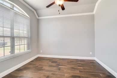 Lakeside living behind the gates, and move-in ready with fresh - photo 11