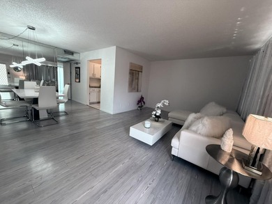Step into this totally renovated 1-bedroom, 1-bathroom condo and - photo 1