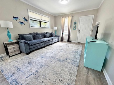 Fully renovated and move-in ready! This charming 3-bedroom - photo 2