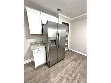 Fully renovated and move-in ready! This charming 3-bedroom - photo 5