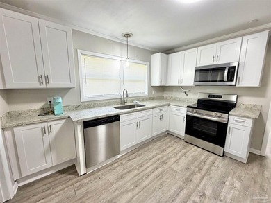 Fully renovated and move-in ready! This charming 3-bedroom - photo 6