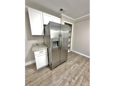 Fully renovated and move-in ready! This charming 3-bedroom - photo 7