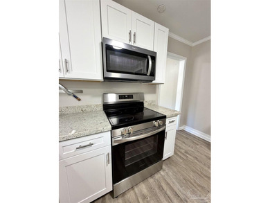 Fully renovated and move-in ready! This charming 3-bedroom - photo 8