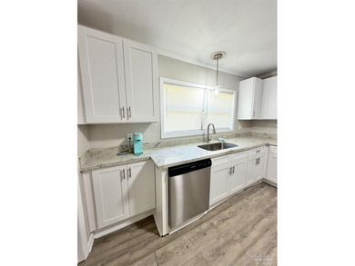 Fully renovated and move-in ready! This charming 3-bedroom - photo 9