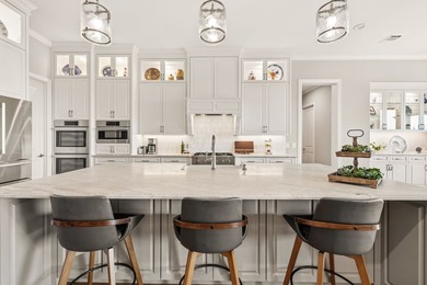 Welcome to a beautifully crafted custom home that seamlessly - photo 12