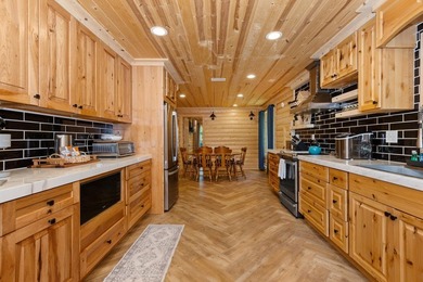 Enjoy peaceful lake living w/ 150' of frontage on private 9-acre - photo 12