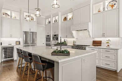 Welcome to a beautifully crafted custom home that seamlessly - photo 13