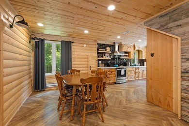 Enjoy peaceful lake living w/ 150' of frontage on private 9-acre - photo 13