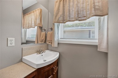 Lakefront living on the desirable 53 Mile Marker! Nestled in the - photo 16