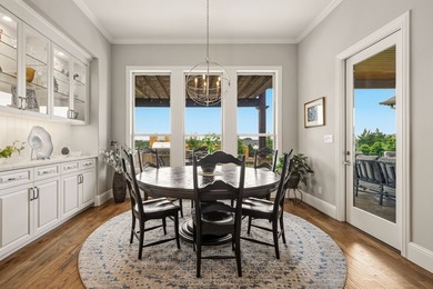 Welcome to a beautifully crafted custom home that seamlessly - photo 17