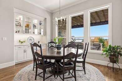 Welcome to a beautifully crafted custom home that seamlessly - photo 18