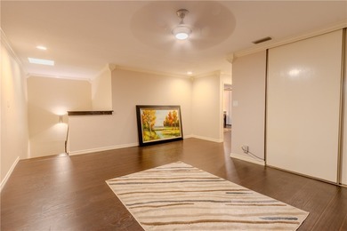 Welcome to this beautifully renovated Courtyard Townhome