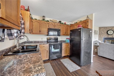 Lakefront living on the desirable 53 Mile Marker! Nestled in the - photo 27