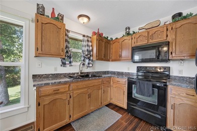 Lakefront living on the desirable 53 Mile Marker! Nestled in the - photo 28
