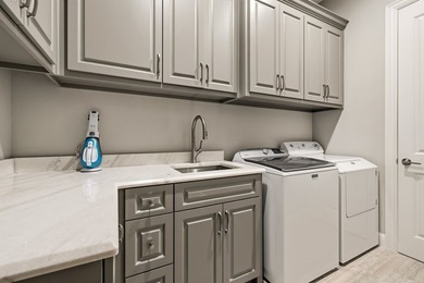 Welcome to a beautifully crafted custom home that seamlessly - photo 31