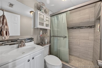 Lakefront living on the desirable 53 Mile Marker! Nestled in the - photo 41