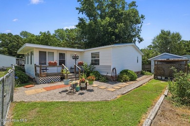Enjoy coastal living and everyday convenience in this - photo 2