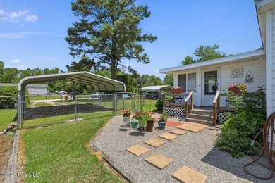 Enjoy coastal living and everyday convenience in this - photo 3