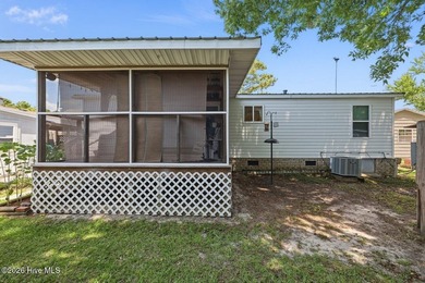 Enjoy coastal living and everyday convenience in this - photo 5