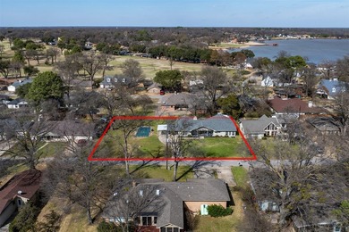 Nestled in a serene golf course community surrounded by a - photo 3