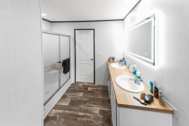 Welcome to this beautiful 2022 mobile home, offering peace of - photo 18