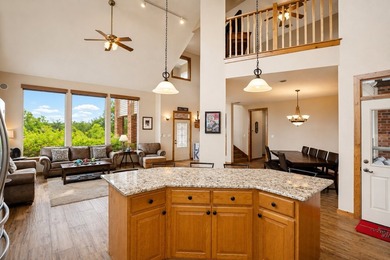 Perched on an oversized corner lot within the prestigious Cliffs - photo 6