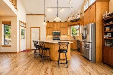 Perched on an oversized corner lot within the prestigious Cliffs - photo 7