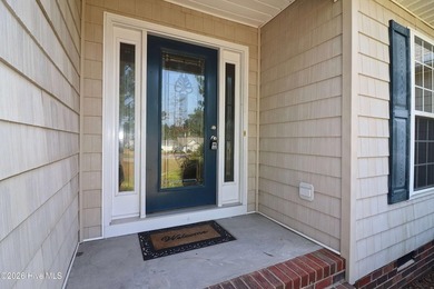Tucked into the established neighborhood in the Whispering Pines - photo 3