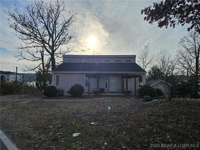 Experience Lake of the Ozarks living at its best in this - photo 2