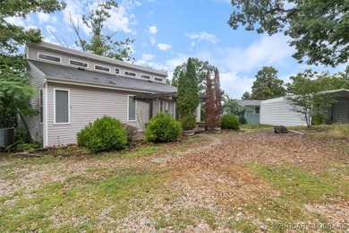 Experience Lake of the Ozarks living at its best in this - photo 3