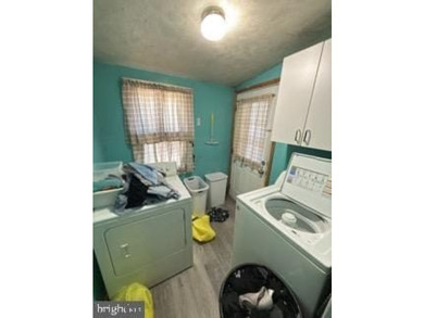 Welcome to a recently renovated 4-bedroom, 1.5-bath home located - photo 5
