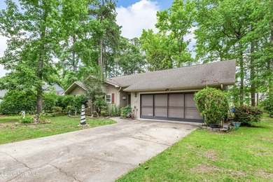 Welcome to this well-maintained 3-bedroom, 2-bath home situated - photo 3