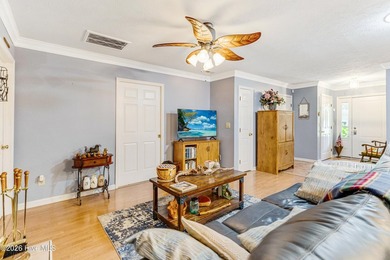 Welcome to this well-maintained 3-bedroom, 2-bath home situated - photo 8