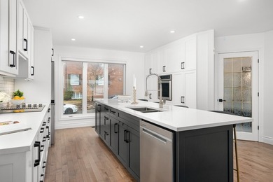 Elegante maison de ville riveraine sur 4 niveaux offrant une vue - photo 9