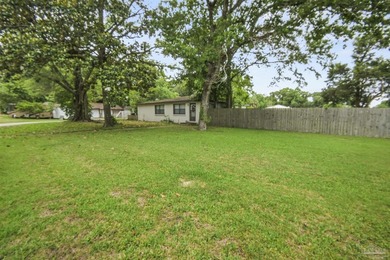This spacious POOL home is positioned on NEARLY AN ACRE in the - photo 5